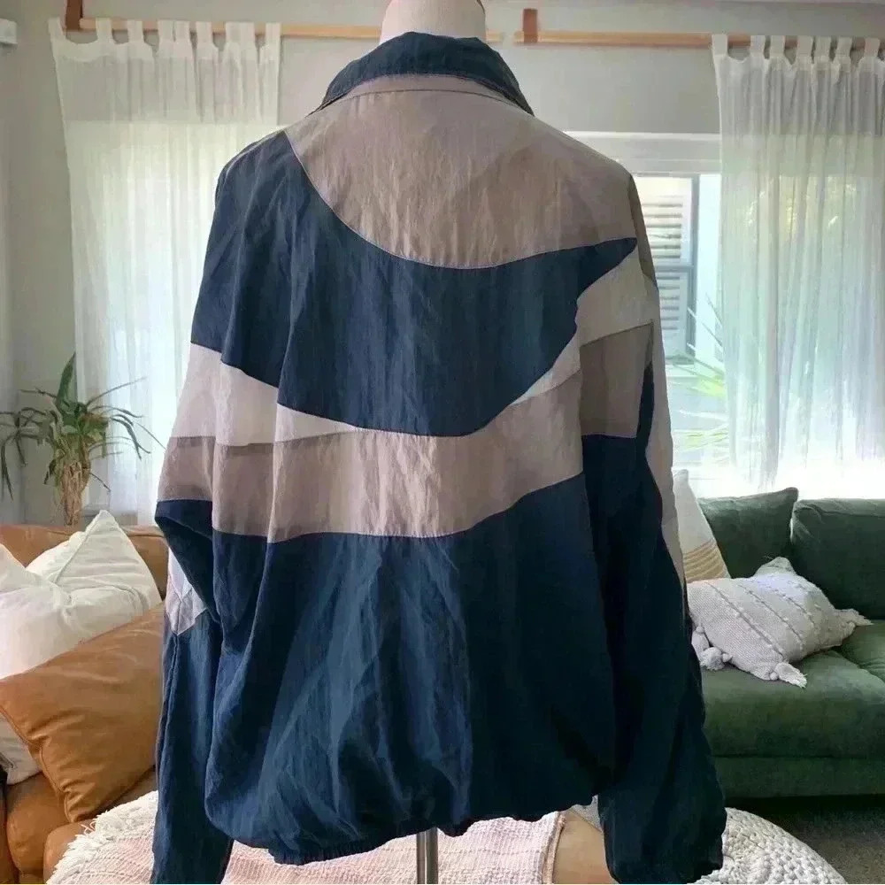 Max Gregor navy and grey windbreaker